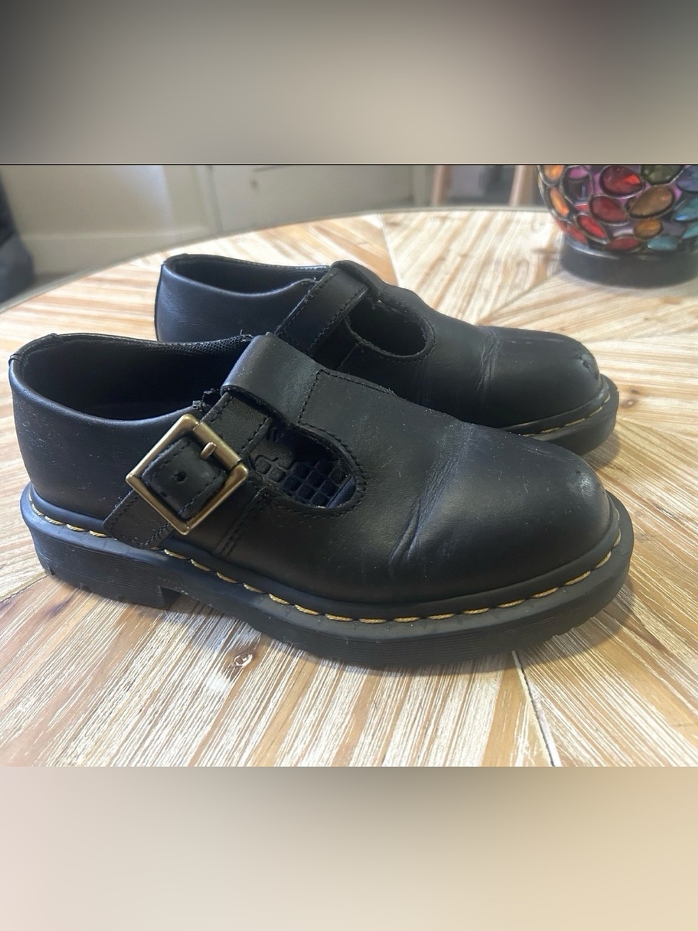 Dr. Martens Kids Black Leather T-Bar Mary Jane Shoes with Brass Buckle